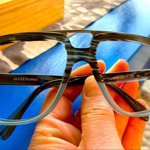 Oliver Peoples specks.